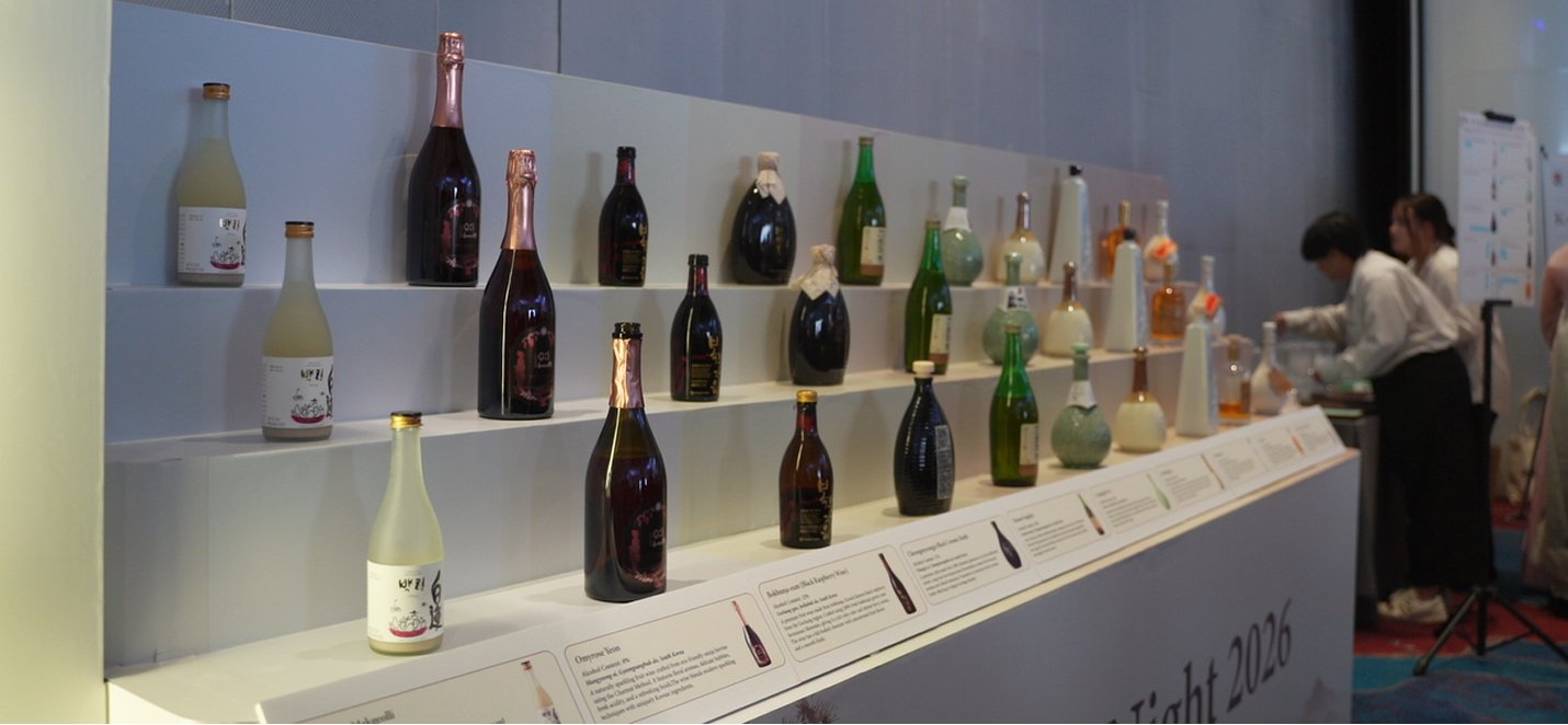 Bottles on the stepped display with tasting notes