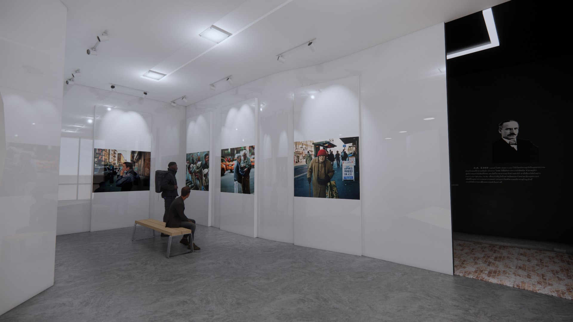 White free-access gallery with photographic prints and a bench