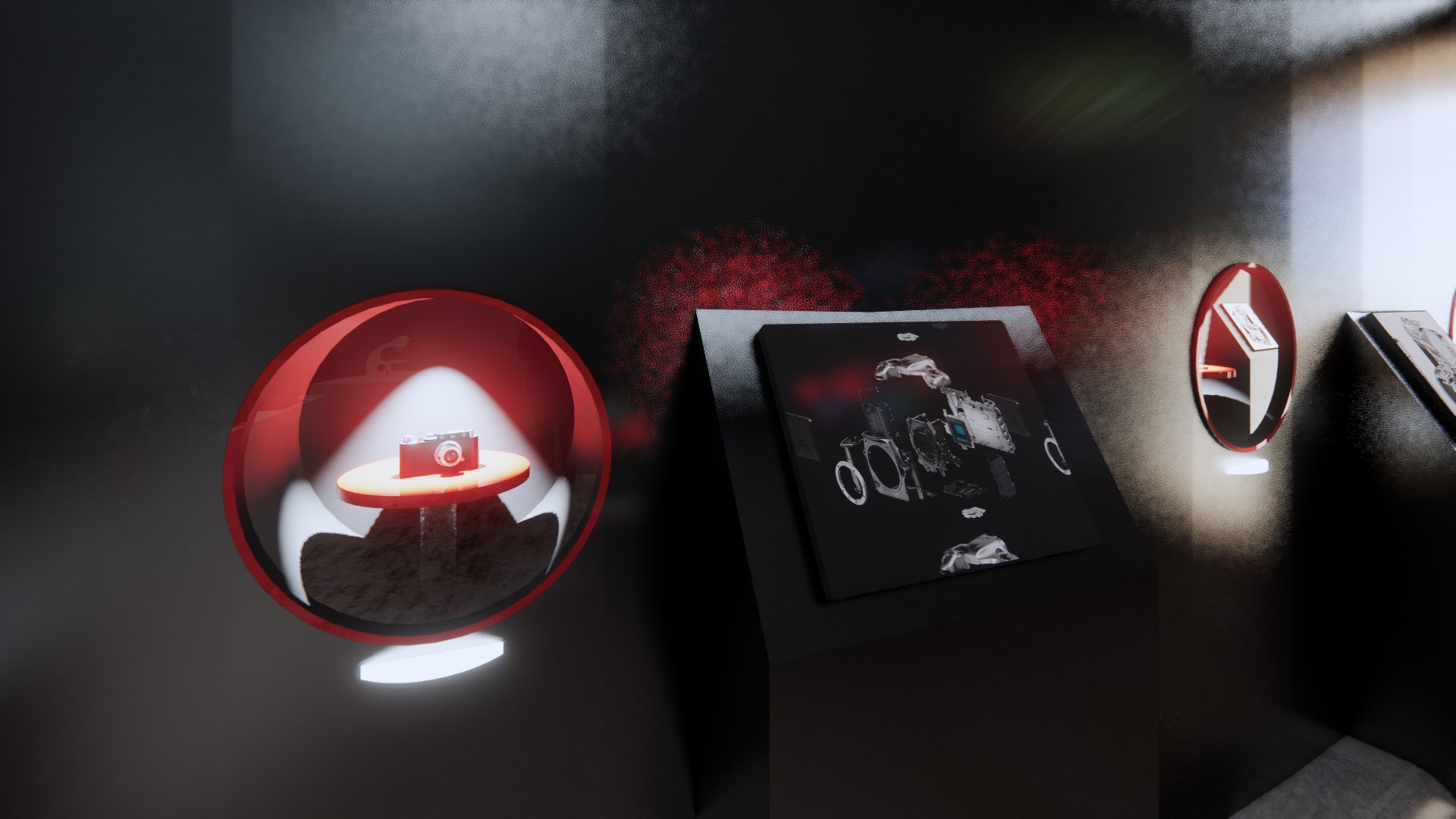 Illuminated red sphere vitrine holding a single camera